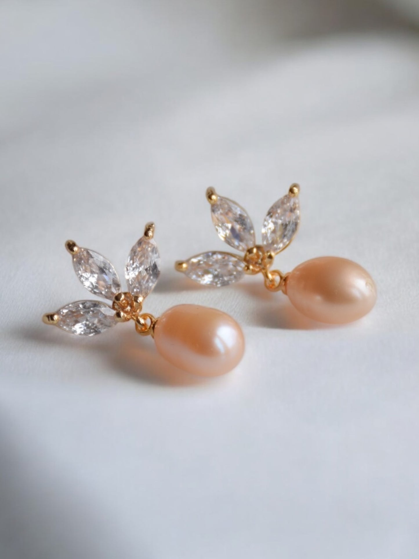 Peach pearl earrings