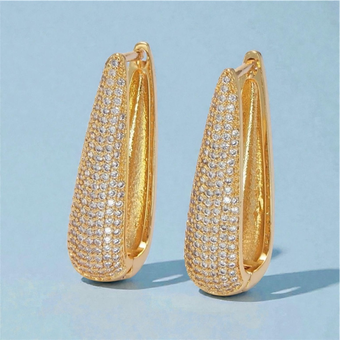 Ellery gold earrings