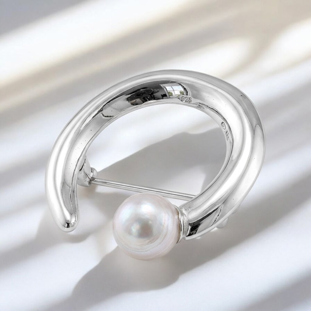 Swing silver brooch