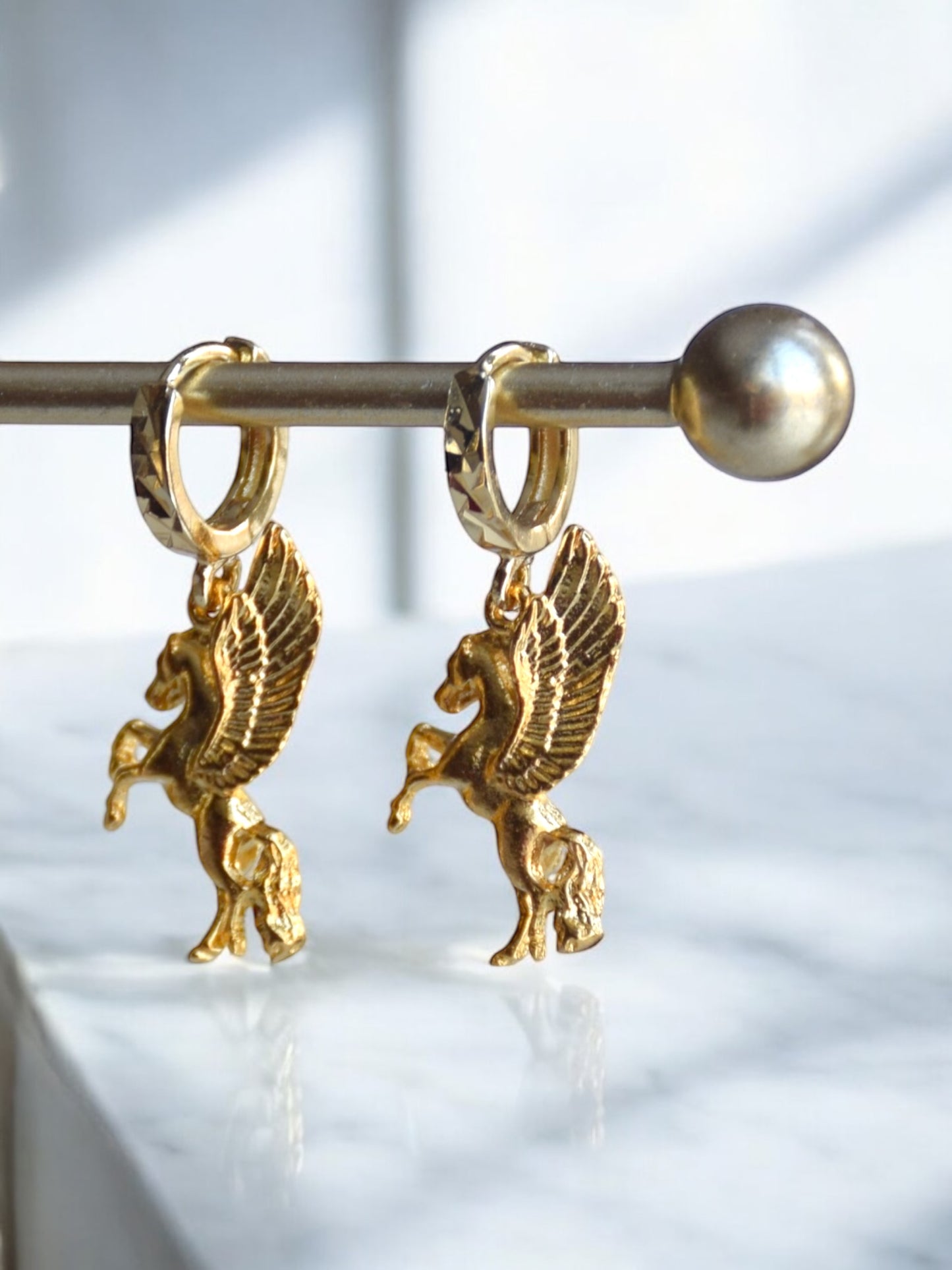 Mira pegasus earrings