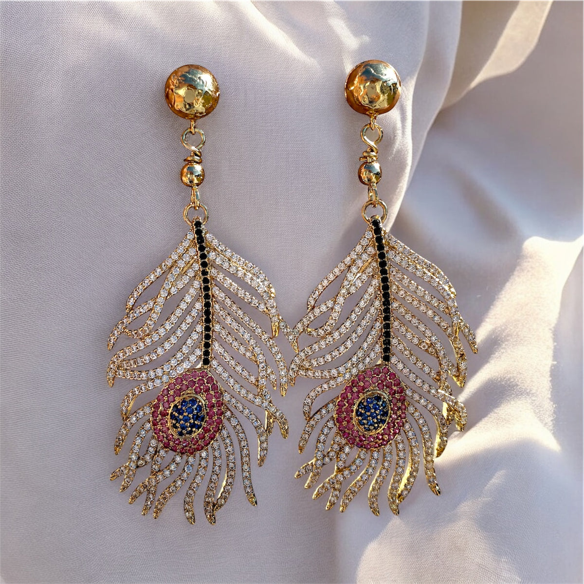 Big feather earrings