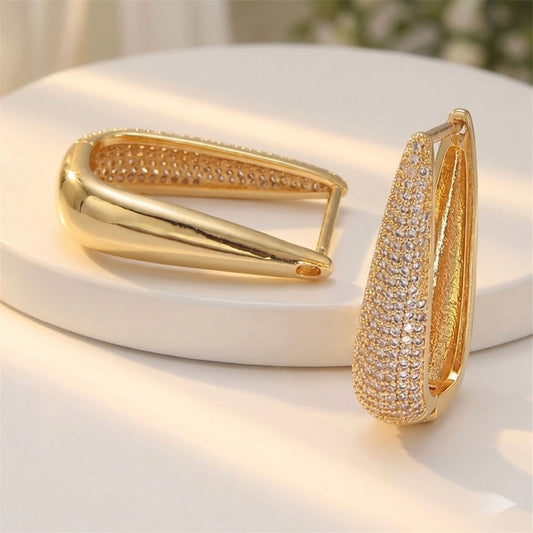 Ellery gold earrings