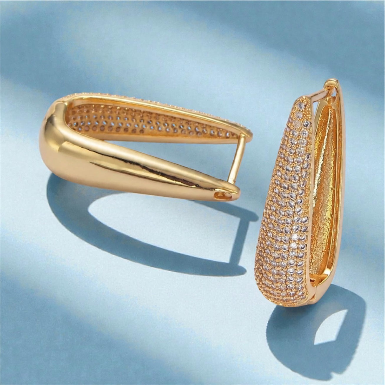 Ellery gold earrings