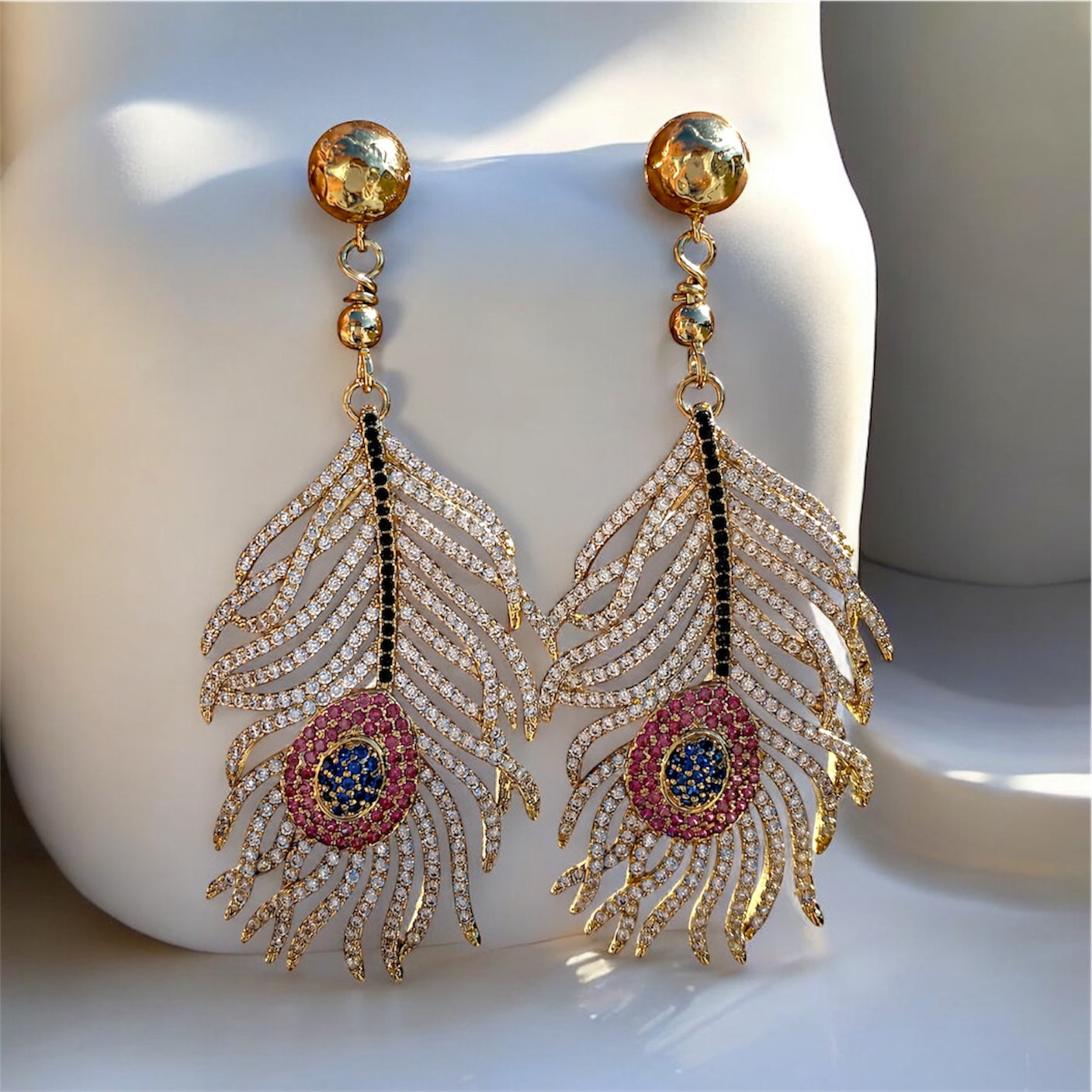 Big feather earrings