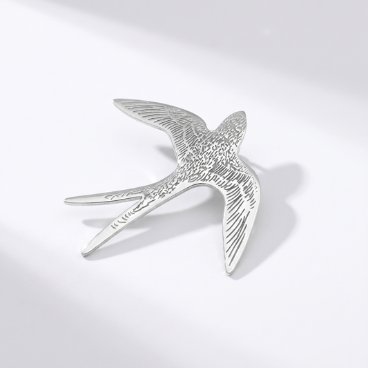 Swallow silver brooch